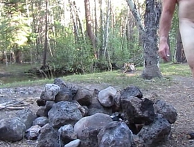 Naked at the fire pit and creek.