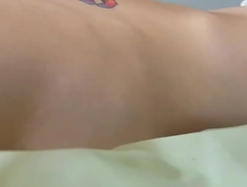 Cute twink with tattoos strokes his big dick and cums