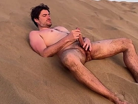 wank on a public nude beach while a friend is filming me